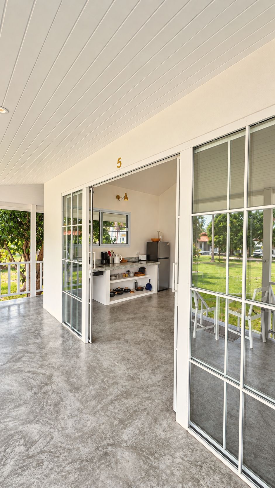 Living room with sliding glass doors to the garden