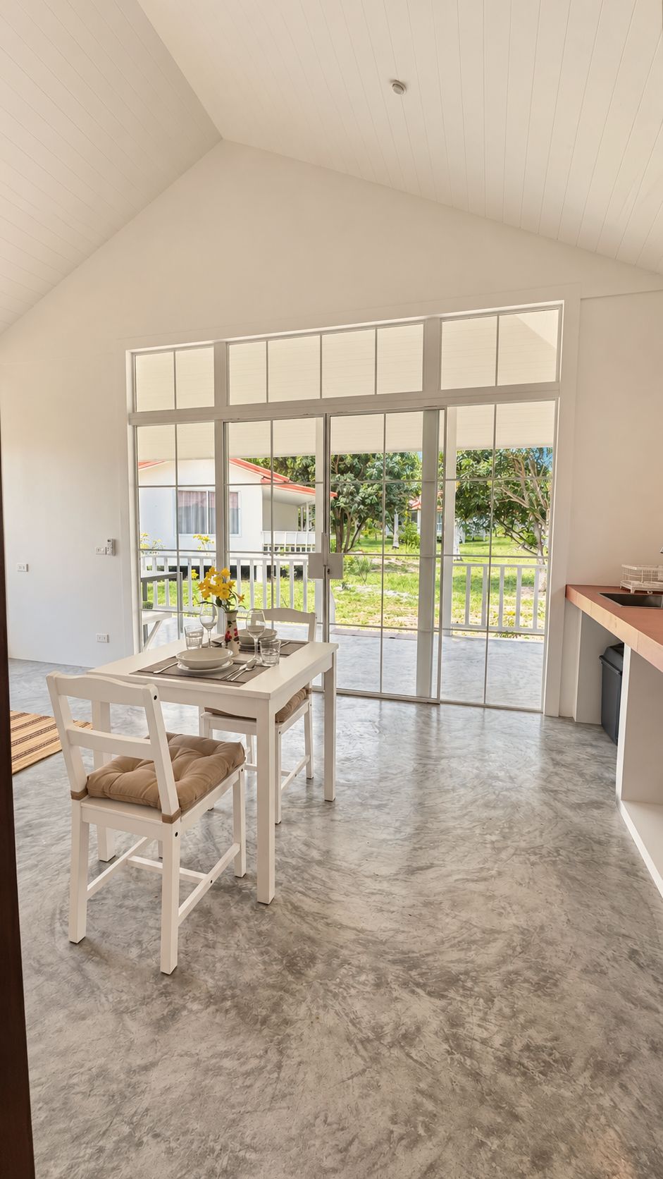 Dining table by the glass doors